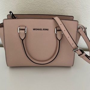 Purse/ over the shoulder/ satchel or handheld